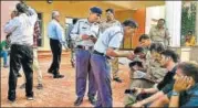  ?? PTI ?? Police and traffic personnel make records following the accident on the Lucknowagr­a Expressway, in Kannauj on Monday.