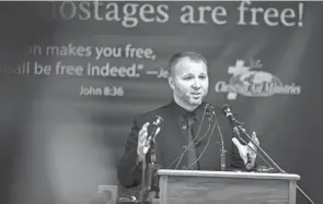  ?? ?? Weston Showalter, the spokespers­on for Christian Aid Ministries, becomes emotional as he tells the hostages’ story during a press conference at Christian Aid Ministries, in Berlin on Monday. All 17 staff members of Christian Aid Ministries who were held hostage in Haiti by the 400 Mawozo gang have returned home. The last 12 hostages escaped.