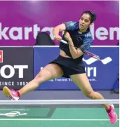  ?? PTI ?? Saina Nehwal in action against F. Fitriani of Indonesia in their women’s singles pre- quarterfin­al in Jakarta on Saturday. —