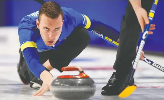  ?? SEAN KILPATRICK/THE CANADIAN PRESS ?? Team Alberta skip Brendan Bottcher delivers the rock while taking on Team Prince Edward Island at the Brier in Kingston, Ont., on Wednesday.