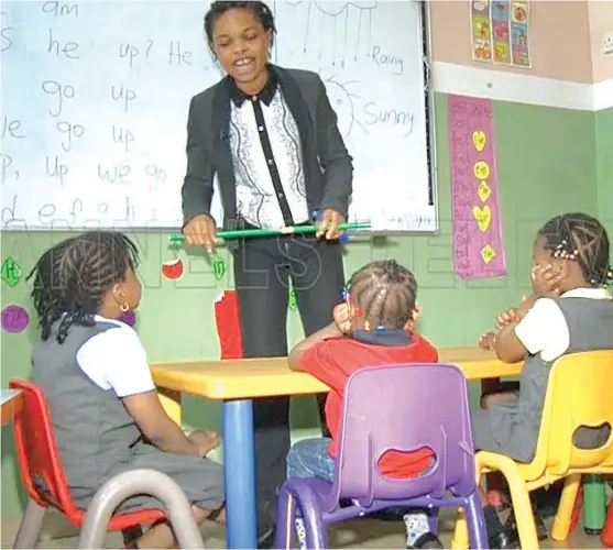  ??  ?? Pupils listening to their teacher in a classroom