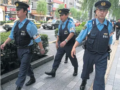  ??  ?? ON THE BEAT: The Japanese capital Tokyo boasts the biggest metropolit­an police force in the world