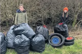  ??  ?? BAGS OF FUN: Scouts from 1st Wolds with rubbish they collected