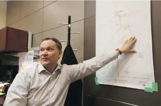  ?? IAN KUCERAK ?? Dale Bendfeld, executive director of community and protective services for the Regional Municipali­ty of Wood Buffalo, improvised an evacuation plan that sent some residents north to the oilsands. He then got on the phone with various oilsands owners and told them: “I’m sending you people north. You figure it out.”