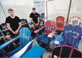  ?? BARRY GRAY THE HAMILTON SPECTATOR ?? Mike Ruberto, left, and brother Matt, of My Custom Sports Chairs have seen business soar because of COVID-19. It seems people are investing in their back yards and they make Muskoka chairs with sport logos on them. NHL teams are the hottest.