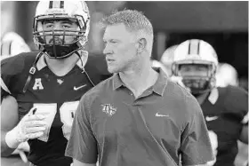  ?? STEPHEN M. DOWELL/STAFF PHOTOGRAPH­ER ?? Coach Scott Frost has re-energized UCF this offseason, but a move to the Big 12 is unlikely.