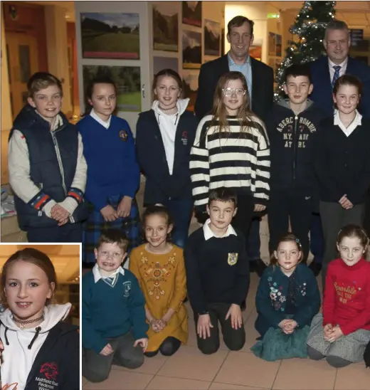  ??  ?? Winners in the Wicklow County Council Christmas Decoration competitio­n with Environmen­tal Awareness Officer Jim Callery and Frank Curran, Chief Executive of Wicklow County Council, at County Buildings.