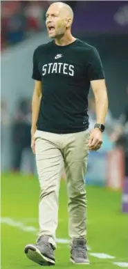  ?? Agence France-presse ?? Iran’s coach Carlos Queiroz (left) and his counterpar­t US coach Gregg Berhalter gesture during their teams’ training sessions.