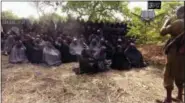  ?? THE ASSOCIATED PRESS ?? This image taken from video by Nigeria’s Islamic extremist network, shows the alleged missing girls abducted from the northeaste­rn town of Chibok.