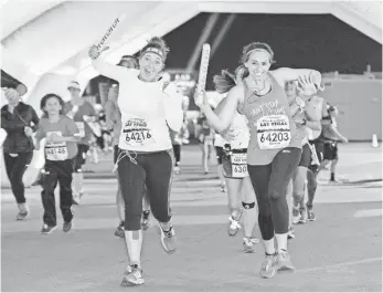  ?? RUNROCKNRO­LL.COM ?? 5K runners race down the middle of the Las Vegas Strip in the Rock ’n’ Roll Marathon.