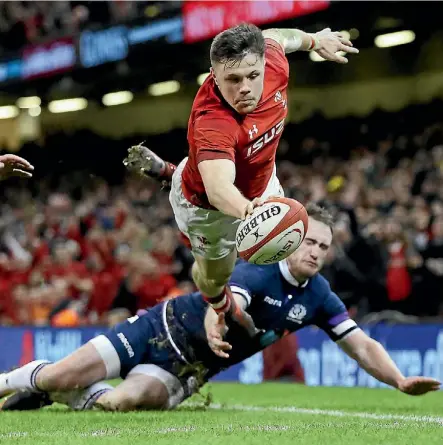  ??  ?? Steff Evans shows balance and poise to score during Wales’ win over Scotland last weekend.