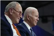  ?? MANUEL BALCE CENETA — THE ASSOCIATED PRESS FILE ?? President Joe Biden and Senate Majority Leader Chuck Schumer, left, listen during an event at Onondaga Community College in Syracuse, N.Y., on Oct. 27.