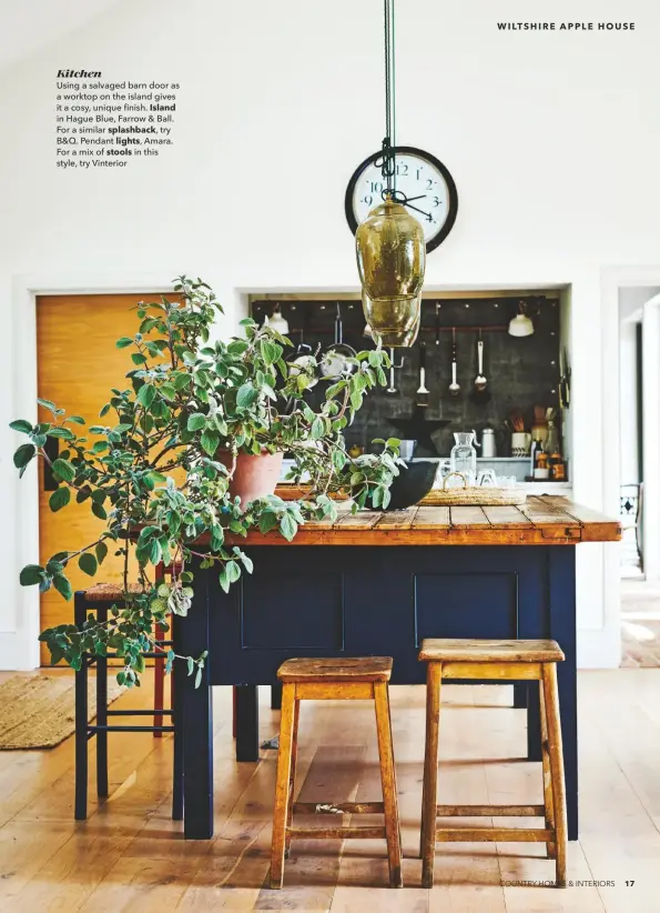  ??  ?? Kitchen
Using a salvaged barn door as a worktop on the island gives it a cosy, unique finish. Island in Hague Blue, Farrow & Ball. For a similar splashback, try B&Q. Pendant lights, Amara. For a mix of stools in this style, try Vinterior