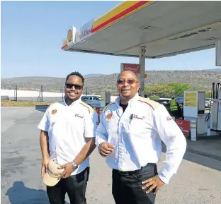  ?? Picture: SUPPLIED ?? PUMPED UP: Entreprene­ur Pumelele Balfour, right, with son, Mbulelo, at one of his establishm­ents, Kei Bridge Ultra City, which he started five years ago thanks to a R5m loan from the Masisizane Fund that he will have paid up in December.