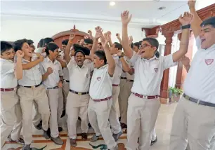  ?? Photo by Dhes Handumon ?? The students of the Indian High School Oud Metha, Dubai, celebrate the achievemen­t of their school soon after the Central Board of Secondary Education released the results of the Class 10 examinatio­ns. Majority of the schools in the UAE yielded good results. —