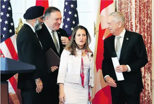  ?? MANUEL BALCE CENETA / THE ASSOCIATED PRESS ?? From left, Defence Minister Harjit Sajjan, U.S. Secretary of State Mike Pompeo, Foreign Affairs Minister Chrystia Freeland and U.S. Defence Secretary Jim Mattis meet Friday in Washington.