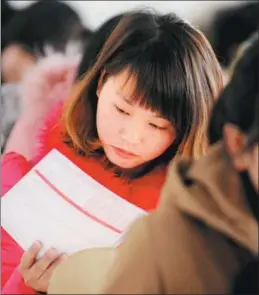  ?? CFP ?? Students take the College English Tests in Shenyang, Liaoning province.