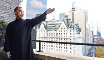  ??  ?? Guo Wengui poses at his New York City apartment. — AFP photo