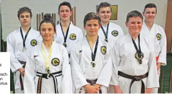  ??  ?? These karateka from from the Okinawa Goju Ryu karate club also snapped up medals in Stellenbos­ch. Front, from left: Tanisha McLellan, Minnaar van Rooyen and Tjaart Helberg. Back: RC Coetzee, Jason van Tonder, Richardu Janse van Rensburg and Justin Stander. Absent: Nico Gertenbach and Sieg Minnie.