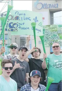  ?? JEAN LEVAC FILES ?? Minto High School students participat­e in the Citizens March organized by Bilingual Ottawa at city hall on May 31. Last year the group urged the city to become officially bilingual, but was turned down