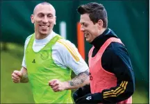  ??  ?? Scott Brown (left) and Callum McGregor in Celtic training