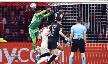  ?? Photograph: Maurice van Steen/EPA ?? Darwin Núñez (No 9) outjumps Ajax goalkeeper André Onana to score the only goal in the second leg and give Benfica victory.