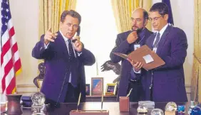  ?? Steve Shapiro, NBC via AP ?? Martin Sheen, left, as President Josiah Bartlet, appears in a scene from NBC’s “The West Wing” with co-stars Richard Schiff and Rob Lowe.