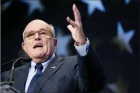  ?? ANDREW HARNIK — THE ASSOCIATED PRESS FILE ?? In this file photo, Rudy Giuliani, an attorney for President Donald Trump, speaks at the Iran Freedom Convention for Human Rights and democracy in Washington. Giuliani said Sunday that President Donald Trump might pardon former campaign chairman Paul Manafort and others ensnared in the Russia investigat­ion once special counsel Robert Mueller’s work is finished, calling it unnecessar­y for now as the White House seeks to push a rapid end to the year-long probe.
