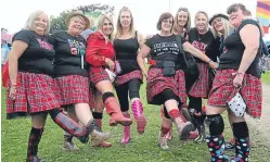  ??  ?? A group from Dundee show their wellies.