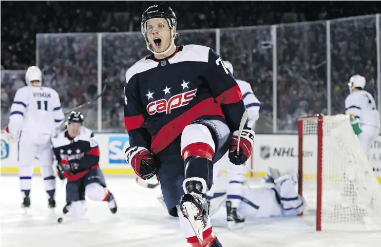  ?? — GETTY IMAGES ?? Washington’s John Carlson celebrates his goal against the Maple Leafs at Navy-Marine Corps Stadium in Annapolis, Md., on Saturday. The Capitals won, 5-2.