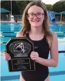  ?? Submitted photo ?? Lake Hamilton seventh grade swimmer Aubrey Schmitt celebrates winning the High Point award at the 2022 USA-Arkansas Long Course Championsh­ips in Forth Smith.
