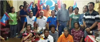  ??  ?? Abel (seated, centre) joins PKR members and other guests for a group photo after the launch of the new sub branch in Riih Mawang.