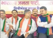  ?? SATISH BATE/HT PHOTO ?? Maharashtr­a BJP chief Chandrakan­t Patil and former CM Devendra Fadavis in a meeting on Thursday.