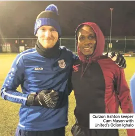  ??  ?? Curzon Ashton keeper Cam Mason with United’s Odion Ighalo