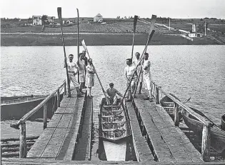  ?? SUBMITTED PHOTO ?? Bob Sexton-built boats, like the one in this picture, were often used in the Mundy Pond Regatta.