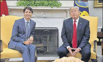  ?? AFP FILE ?? US President Donald Trump and Canadian Prime Minister Justin Trudeau