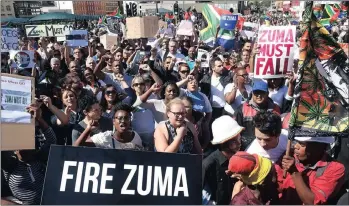  ?? PICTURE: PHANDO JIKELO ?? SHARING OBJECTIVES: Save South Africa supporters march to Parliament demanding President Jacob Zuma’s resignatio­n. But would an equal number of people march against the inhumane living conditions in the townships, asks the writer?