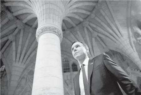  ??  ?? Minister of Finance Bill Morneau walks through the rotunda after tabling the federal budget on Parliament Hill.