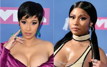  ??  ?? Combinatio­n pictures show Cardi B (left) and Minaj at the 2018 MTV Video Music Awards last month in New York. — AFP file photos