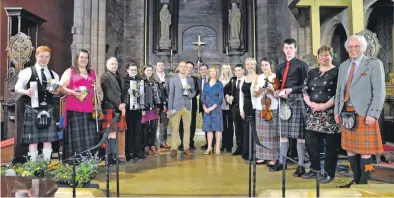  ?? 16_T18_ H&I M&D Festival_ Accordion and Fiddle Masters_ 02 ?? Competitor­s and judges of the Accordion and Fiddle Masters at St John’s Cathedral on Friday.