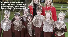  ?? ?? FESTIVE WISHES Darragh & kids help Kathryn Thomas & Barretstow­n CEO Dee Ahearn, launch charity’s Xmas appeal