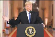  ?? Evan Vucci / Associated Press ?? President Donald Trump speaks during a news conference in the East Room of the White House on Wednesday.