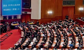  ?? Dong Ning ?? 20 de marzo de 2018. La Ley de Supervisió­n de la República Popular China es adoptada en la primera sesión de la XIII Asamblea Popular Nacional.