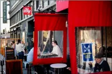  ?? AP FILE PHOTO/NOAH BERGER ?? In this Oct. 21 file photo, people dine in San Francisco’s Marina district.