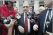  ?? MARY ALTAFFER — THE ASSOCIATED PRESS ?? Former New York Assembly Speaker Sheldon Silver, center, is surrounded by reporters as he leaves federal court in New York after his sentencing, Friday.