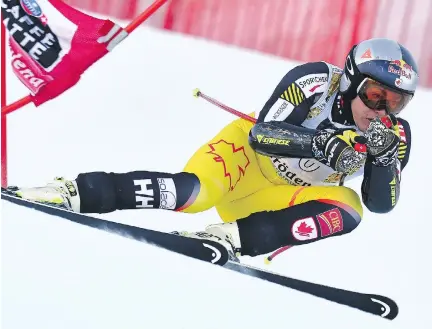  ?? ALBERTO PIZZOLI/GETTY IMAGES ?? Canada’s Erik Guay races to a bronze medal in the men’s super-G event at Friday’s World Cup stop in the Italian Alps.