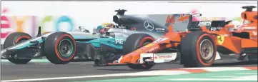  ??  ?? Hamilton passes Ferrari’s Sebastian Vettel of Germany on track during practice for the Grand Prix of Mexico at Autodromo Hermanos Rodriguez in Mexico City. — AFP photo