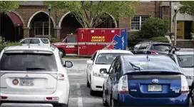  ?? CHAD RHYM / CHAD.RHYM@AJC.COM ?? DeKalb County’s six-month contract extension with American Medical Response requires ambulances to arrive at the scene of serious incidents within nine minutes and to respond to all other calls within 15 minutes.