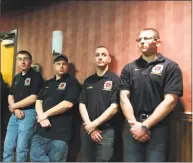  ?? Meghan Friedmann / Hearst Connecticu­t Media ?? Members of North Branford's Volunteer Fire Department await the start of budget deliberati­ons on Thursday.