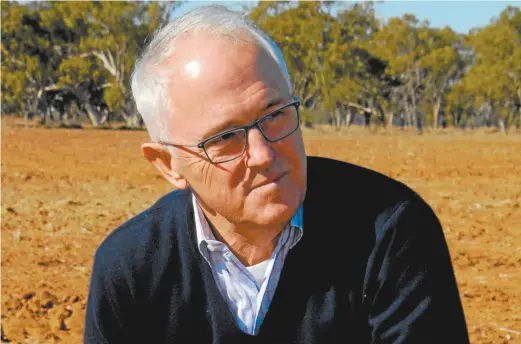  ??  ?? Malcolm Turnbull during a visit to a farm in Trangie, NSW, this week.